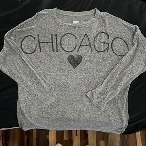 Women's long sleeve top with CHICAGO on back